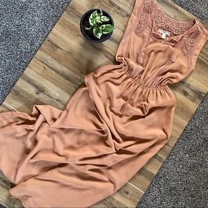 Coral maxi dress with crochet detail.